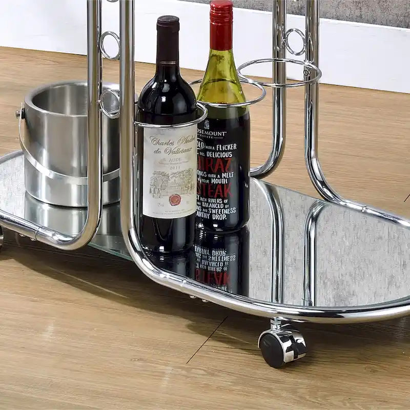Desserte moderne chromée avec plateau en verre et roulettes